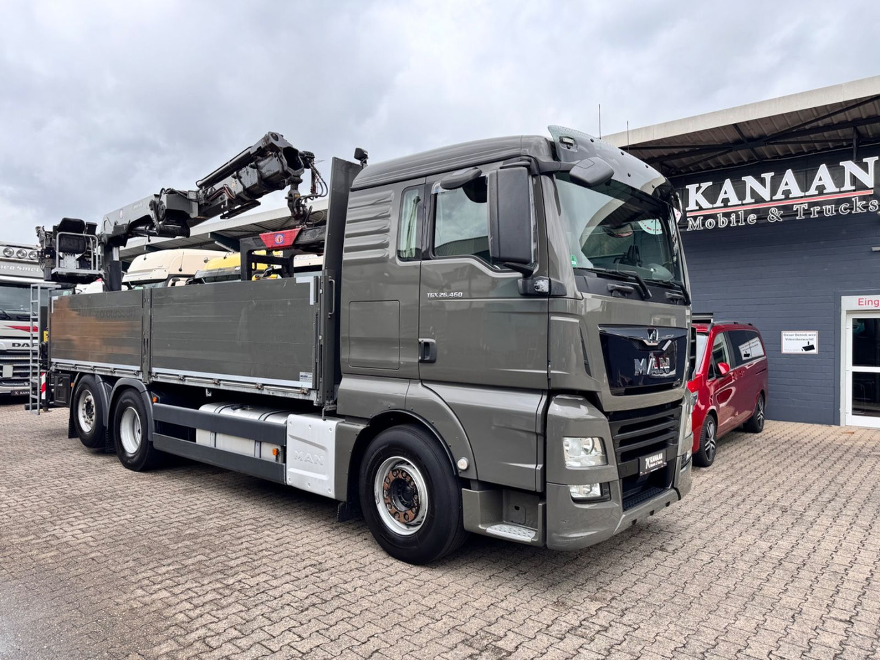MAN 26.460 TGX Baustoffkran HMF 2110-L3 - Камион с кран: снимка 1 MAN 26.460 TGX Baustoffkran HMF 2110-L3 - Камион с кран: снимка 1