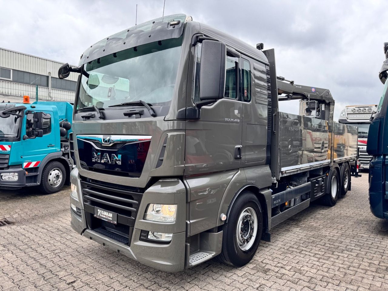 MAN 26.460 TGX Baustoffkran HMF 2110-L3 - Камион с кран: снимка 2 MAN 26.460 TGX Baustoffkran HMF 2110-L3 - Камион с кран: снимка 2