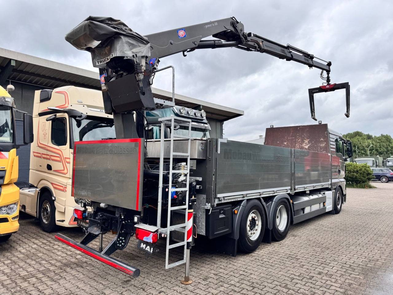 MAN 26.460 TGX Baustoffkran HMF 2110-L3 - Камион с кран: снимка 5 MAN 26.460 TGX Baustoffkran HMF 2110-L3 - Камион с кран: снимка 5